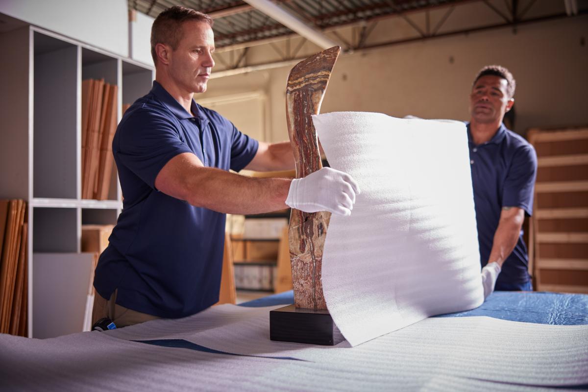 Packing an antique sculpture at The Packaging Store